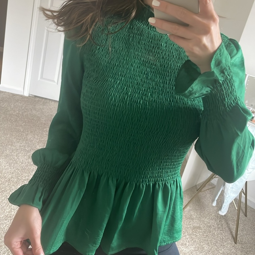 Emerald green peplum top